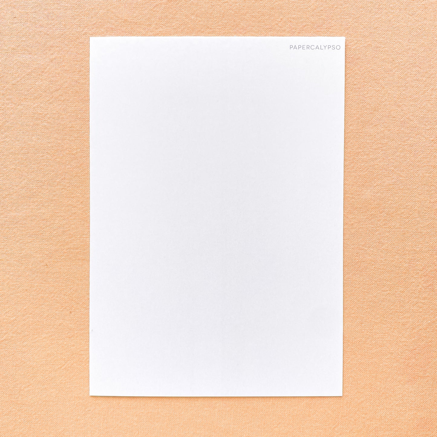 on the back is lots of space to write a message, the only thing printed there is a little watermark "Papercalypso" in the corner.