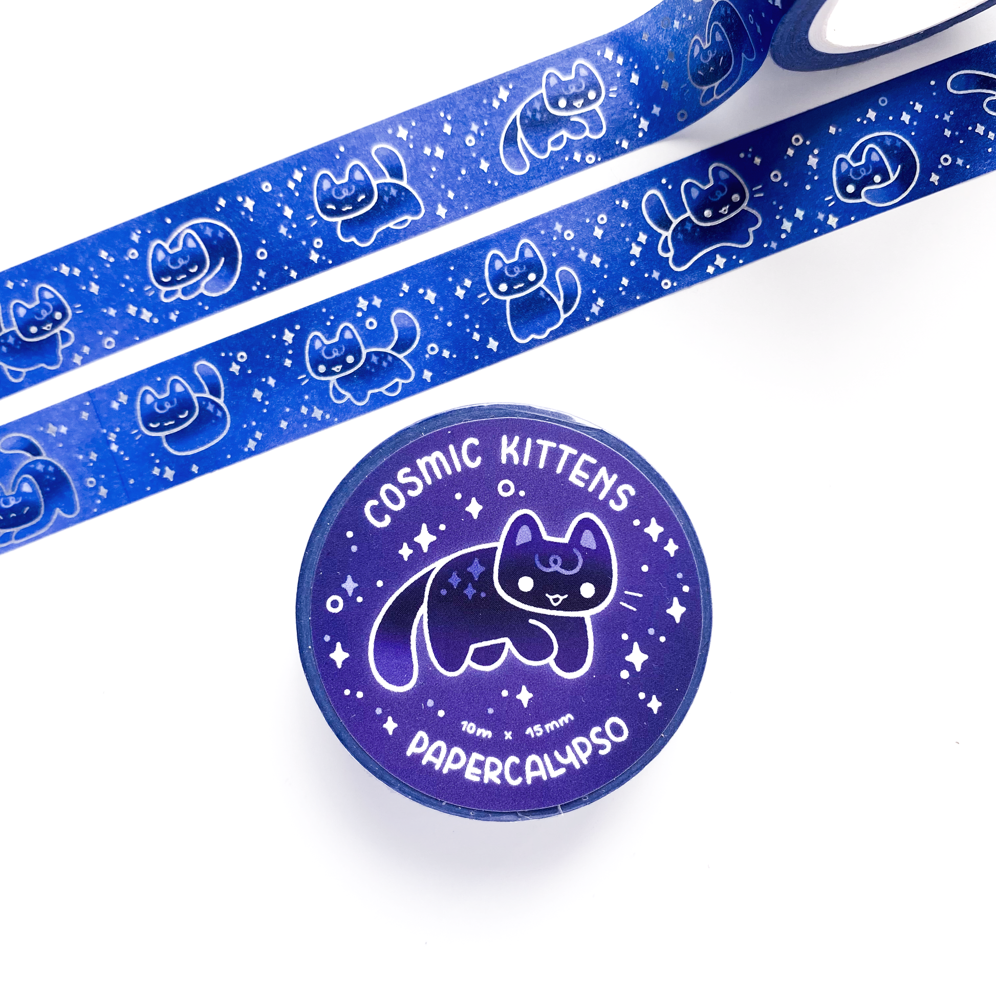 kawaii cosmic cat themed washi tape featuring soft glowing cats in a dark blue starry sky. The cats are happily jumping and playing among the stars.