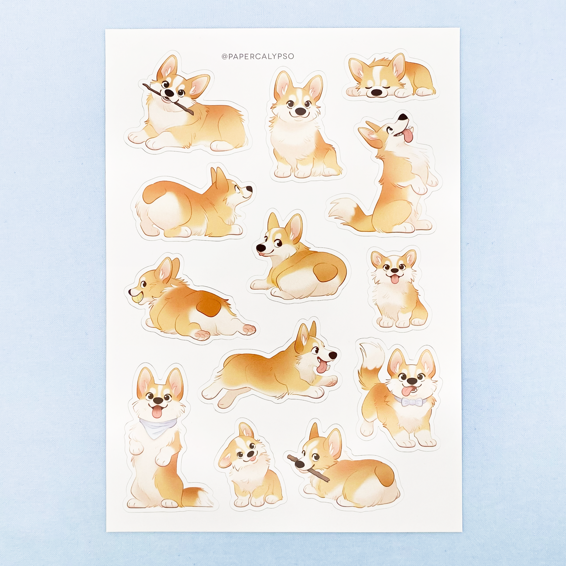 The corgis are warm pastel colours with some blue accents. The potatoes are fluffy and have short and long tails. The sticker sheet has 13 unique stickers printed on white glossy thin vinyl. This makes them sturdy and waterproof, but not too thick to use in a journal.