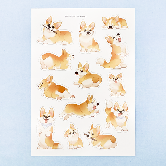 The corgis are warm pastel colours with some blue accents. The potatoes are fluffy and have short and long tails. The sticker sheet has 13 unique stickers printed on white glossy thin vinyl. This makes them sturdy and waterproof, but not too thick to use in a journal.