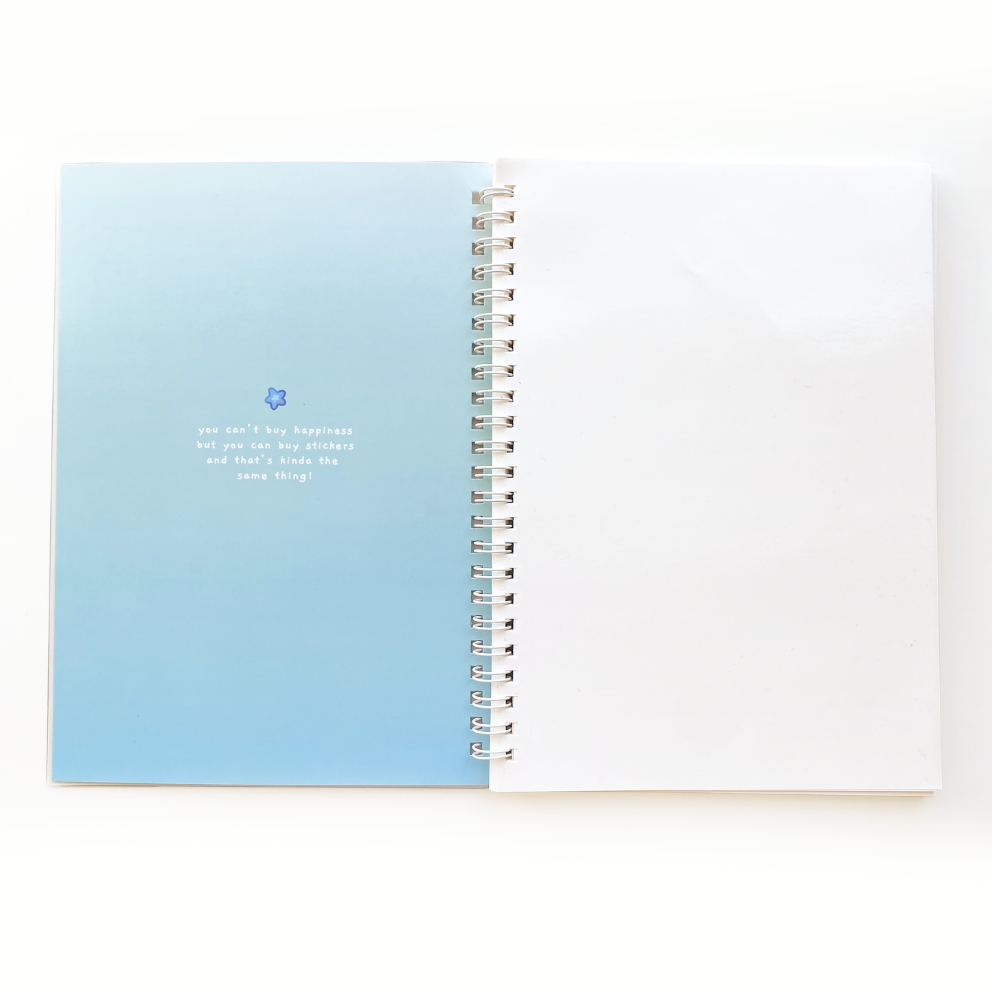 the cover inside features a little starfish and a cheesy sentence: You can't buy happiness but you can buy stickers and that's kinda the same thing!