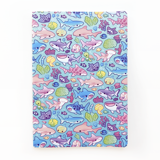 the notebook cover has many different sharks, rays, corals and more! whale shark, blue shark, black-tipped reef shark, great white, tiger shark, nurse shark, leopard shark, white-tipped reef shark, hammerhead shark, surgeon fish, lobster, eel, manta ray, spotted ray, dumbo octopus, nautilus, sea turtle.