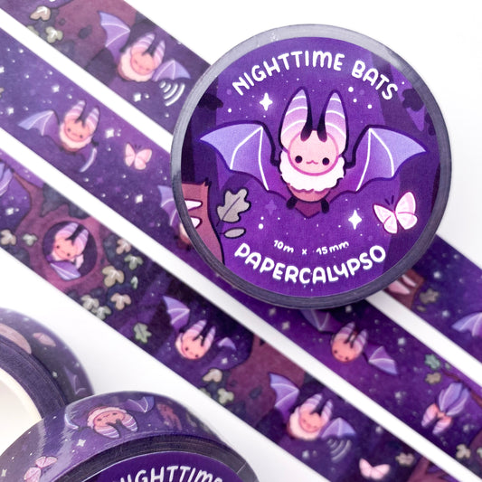 kawaii bat themed washi tape featuring a nighttime forest scene full of bats. It's the night of the full-moon. Some bats are flying about, while others are resting in the ivy-covered oak trees.
